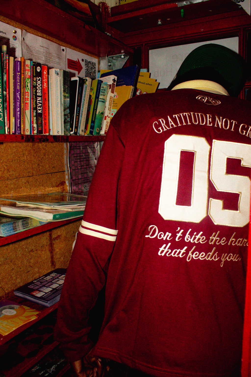 GNG Rugby Long-Sleeve Polo in burgundy, 05 back with Don't bite the hand that feeds you embroidery